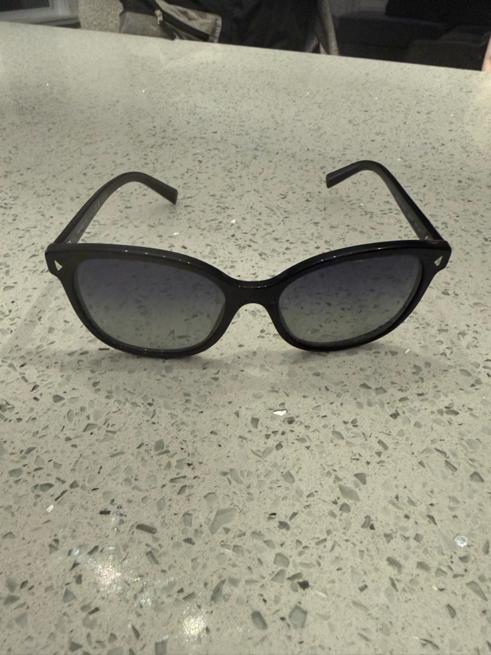 Prada Women's Black Sunglasses with Gray Gradient Lenses